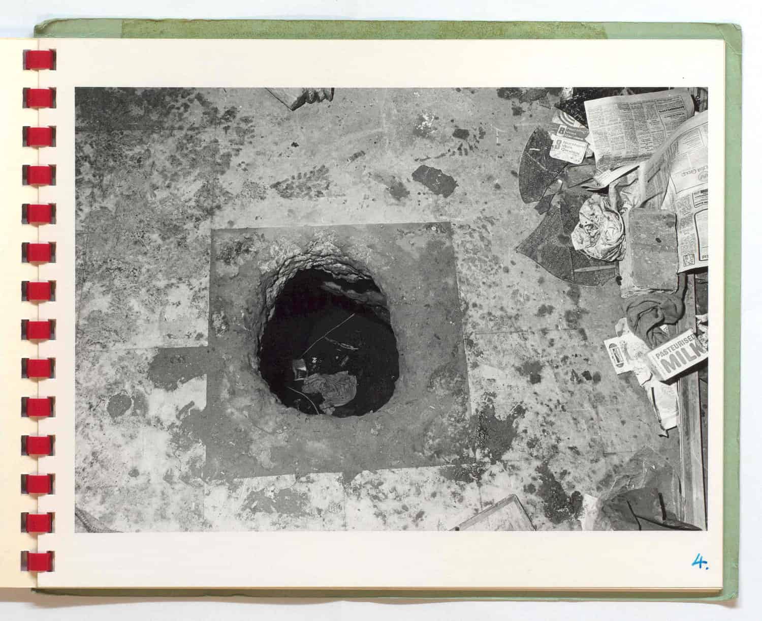 A hole dug into the concrete of a cell.